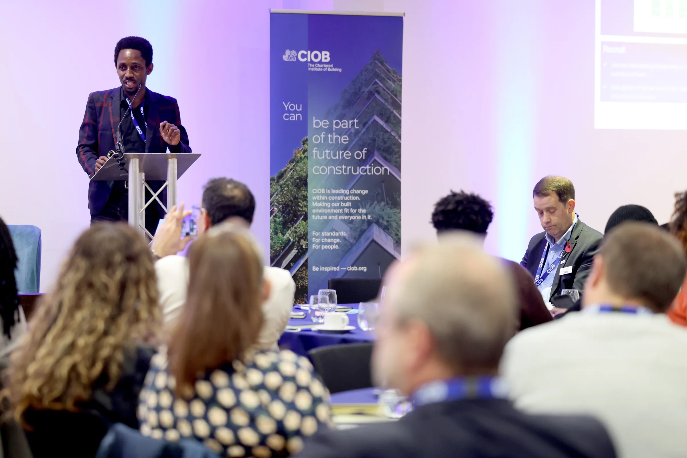 Kufre Antia speaking at a Chartered Institute of Building event
